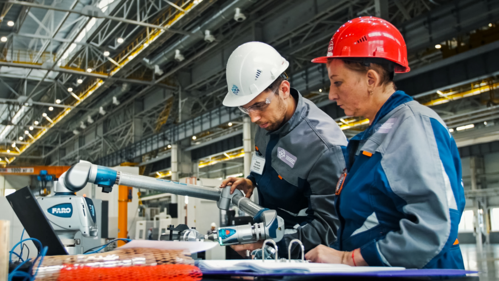 two workers in futuristic warehouse